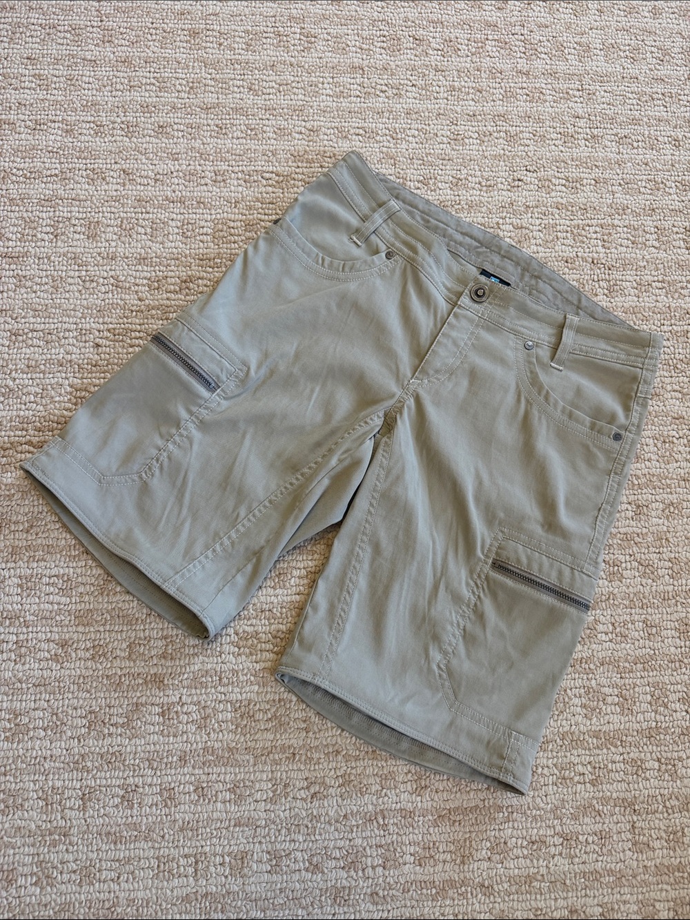 Kuhl women’s khaki hiking style shorts, size 4.